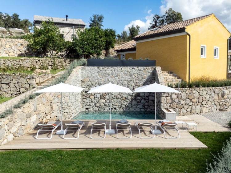 Plunge pool with sun deck and lawn