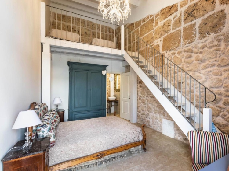 Double ensuite room with mezzanine at MichaEl Garden boutique hotel Noto 